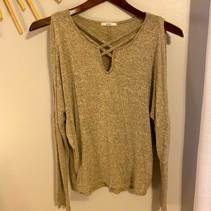 Tan sweater with crisscrossing design